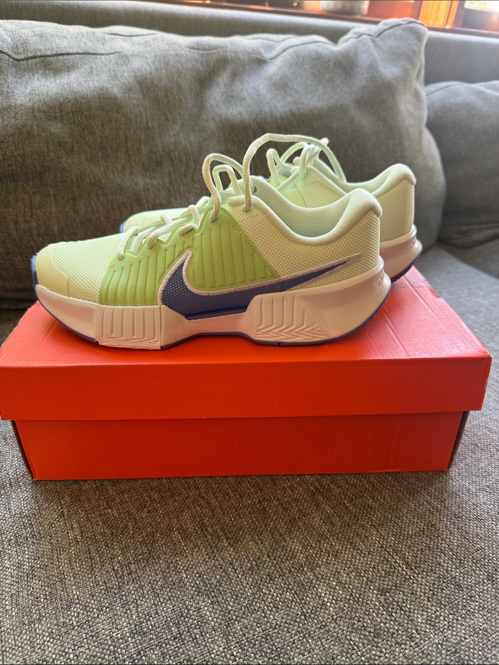 Women’s Nike tennis hard court Light Green Sneakers with Purple Swoosh